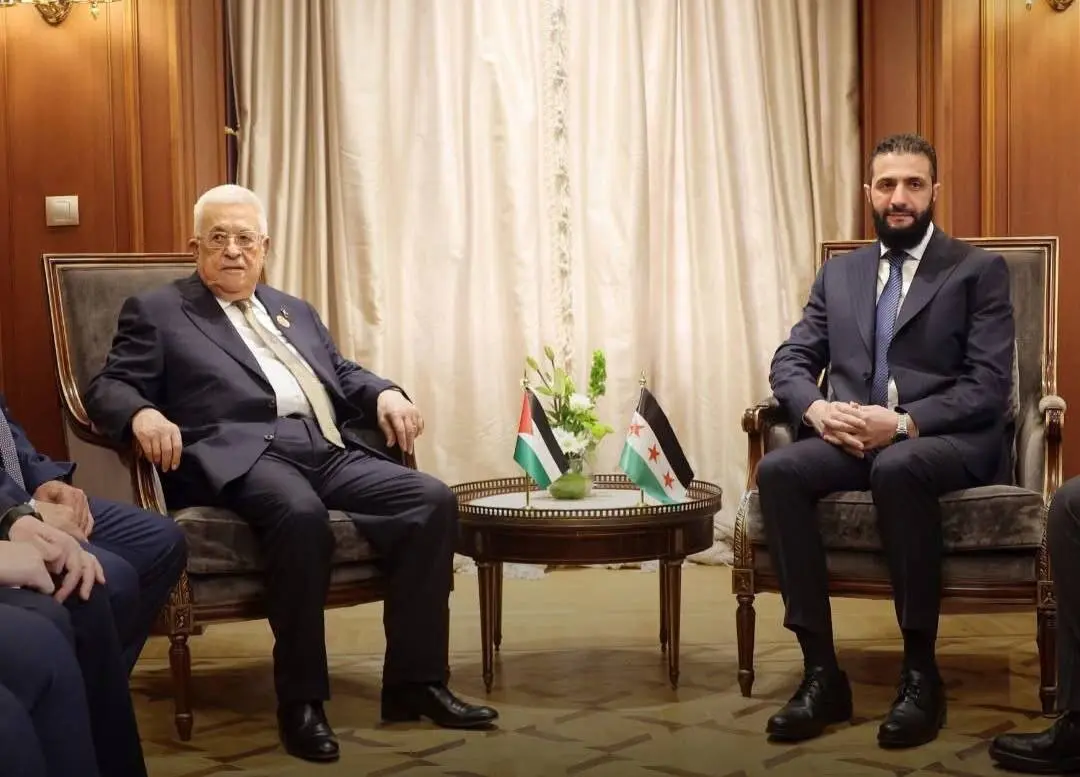 پرچم وارونه حکومت جولانی در دیدار وی با ابومازن