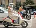 عکس | تصویری پربازدید از یک بانوی موتورسوار با حجاب کامل