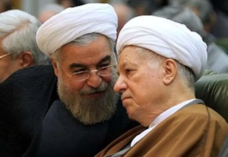 تصویری قدیمی از حسن روحانی و هاشمی‌رفسنجانی با لباس نظامی