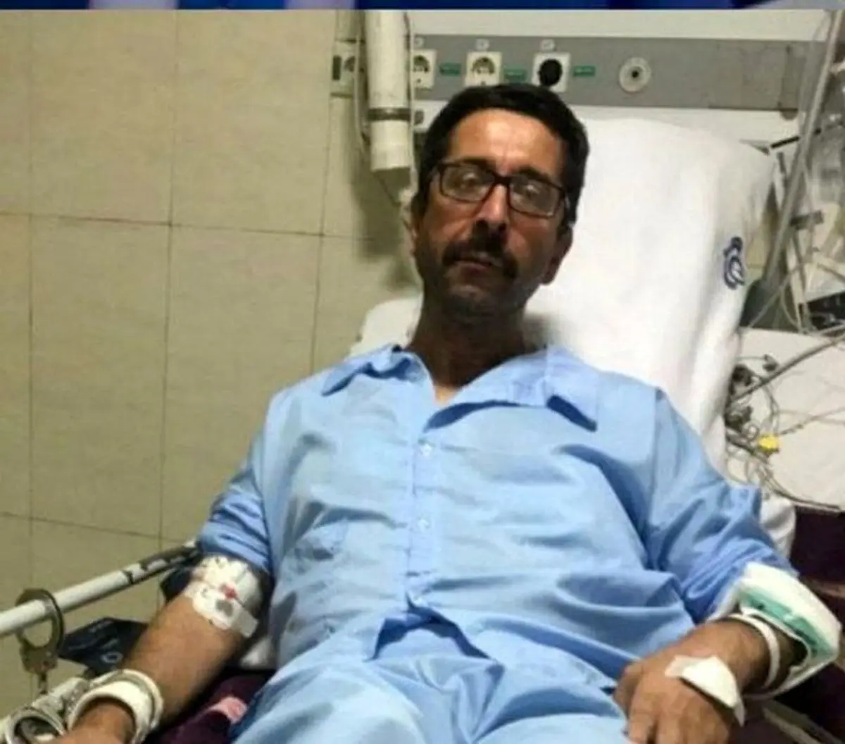واکنش دادگستری به عکس جنجالی از حمید قره‌حسنلو با دستبند در بیمارستان؛ حالش مساعد است!